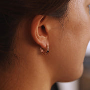 Picture of 14k gold ascending hoop earrings 14k
