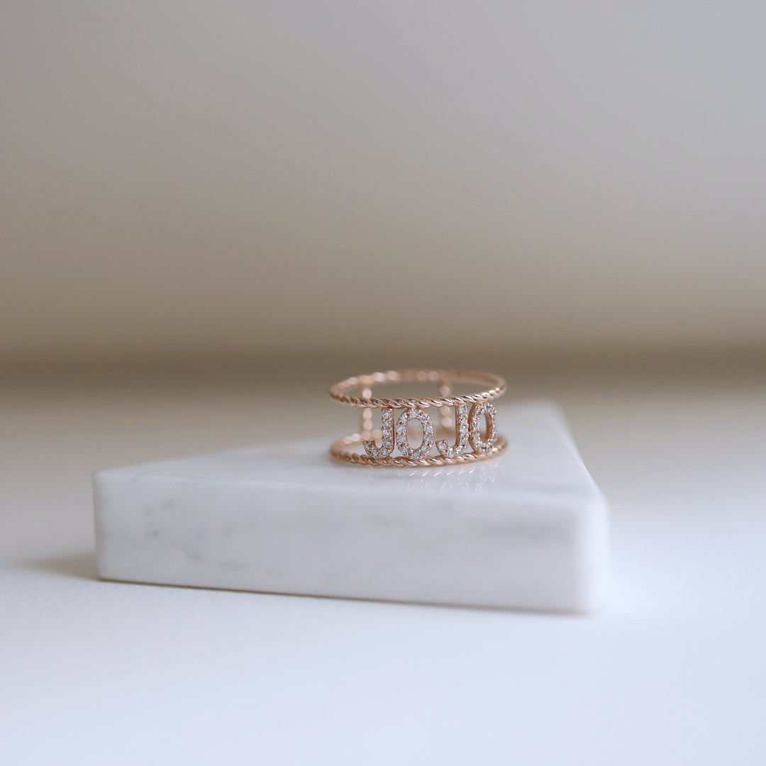 Picture of personalized diamond braided ring