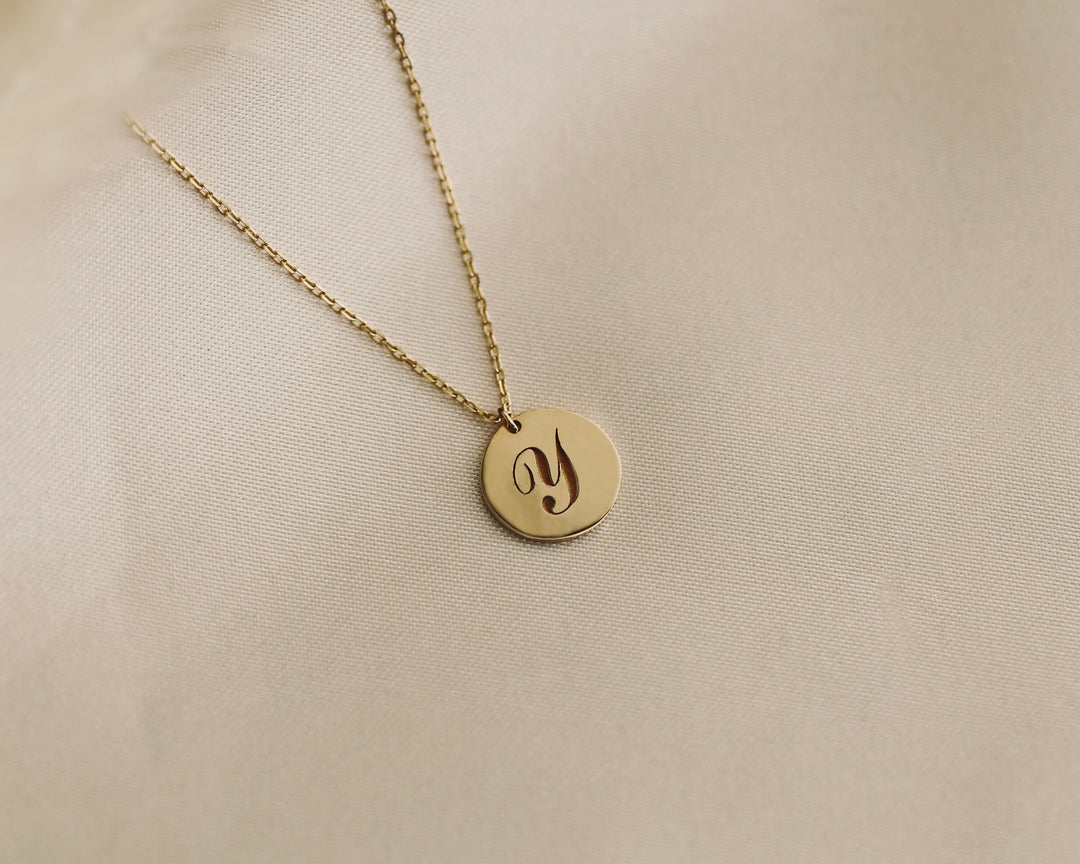 Picture of 14k initial coin necklace coin necklace